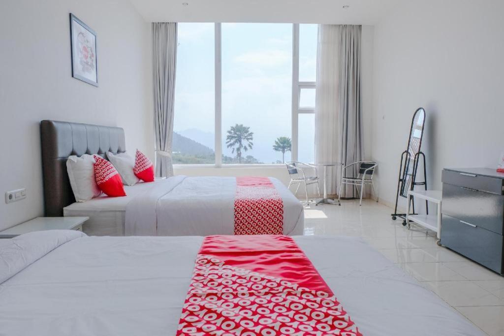 Oyo 1194 Villa Bukit Panderman Residence Batu  Luaran gambar
